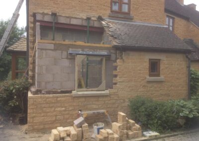 stone extension and window frame on a house in worcestershire